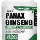 Panax ginseng tablets in a bottle, used as a ginseng supplement.